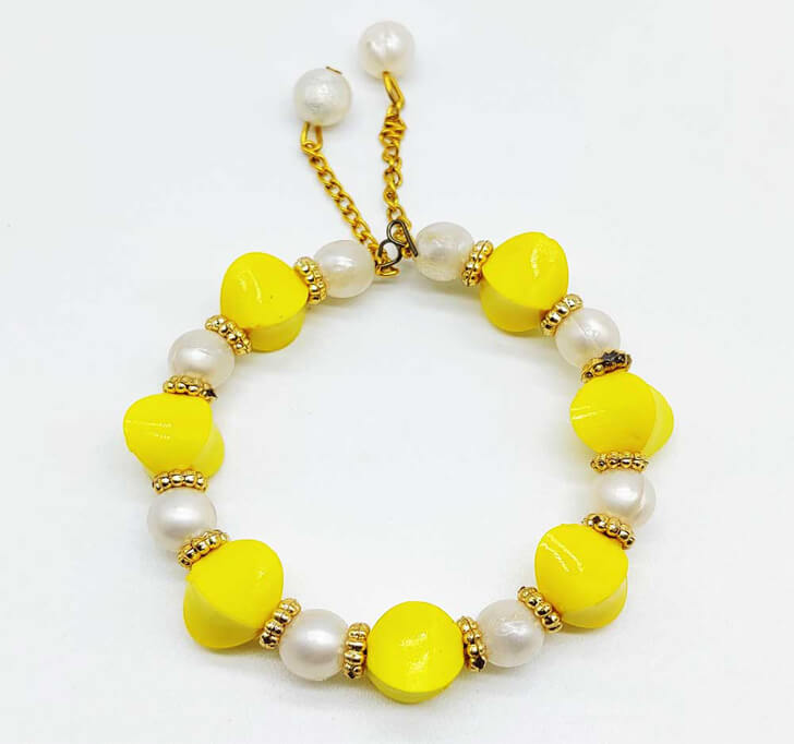 Buy Yellow Designer Beads White Pearl Kada Rakhi