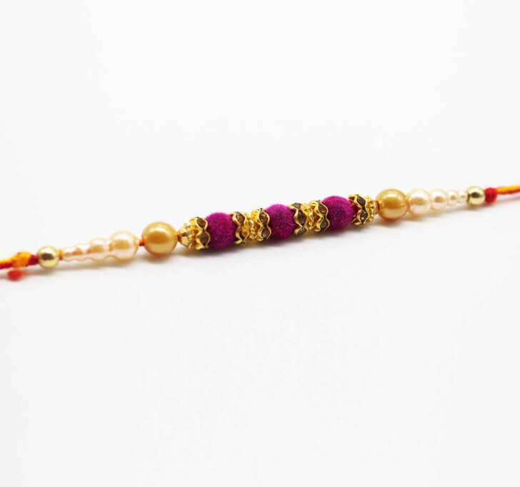 Buy Purple Fancy Beads Dora Bhaiya Rakhi