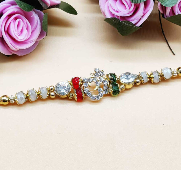 Buy OM Diamond Center Piece Bhaiya Dora Rakhi