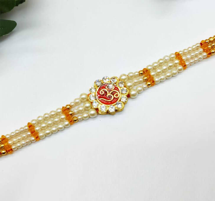 Buy OM Diamond Stone Center Piece Bracelet Bhaiya Rakhi
