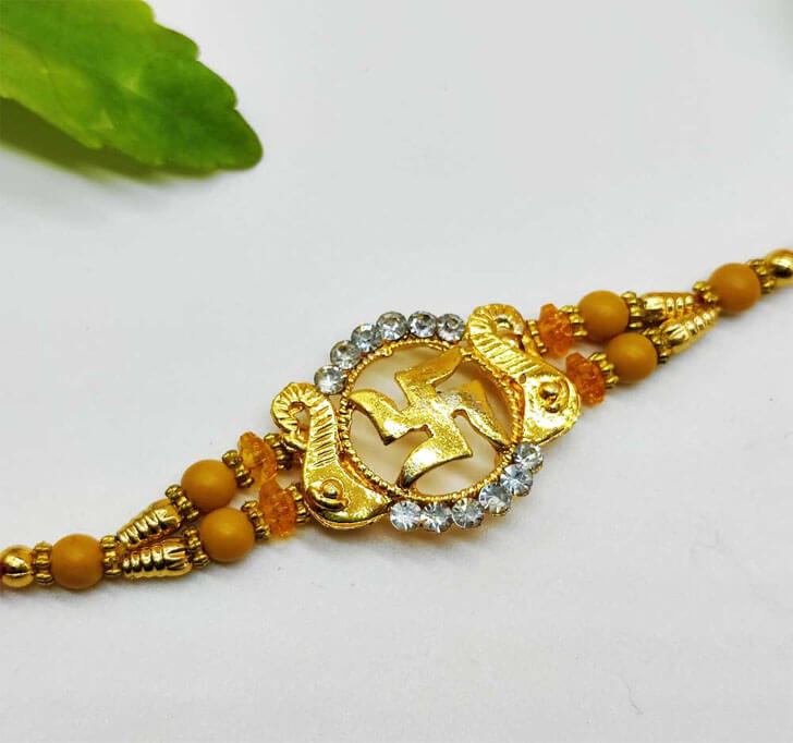 Buy Swastik Golden Center Piece Bhaiya Rakhi