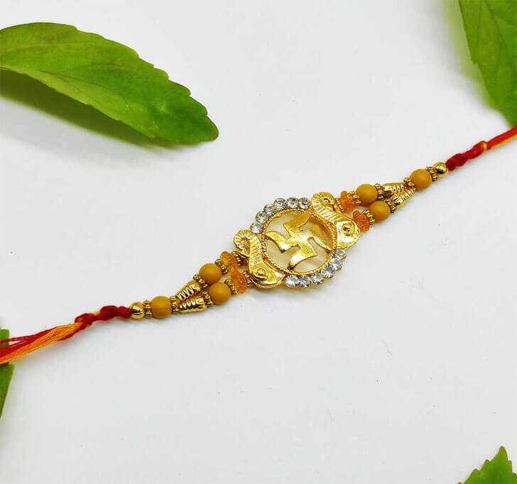 Buy Swastik Golden Center Piece Bhaiya Rakhi