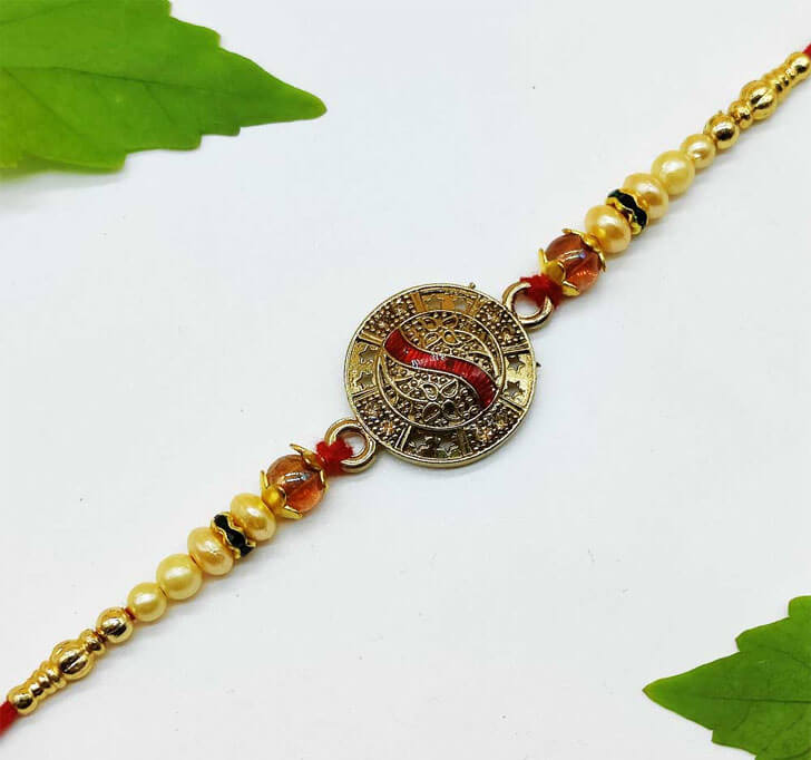 Buy Golden Traditional Center Piece Bhaiya Rakhi