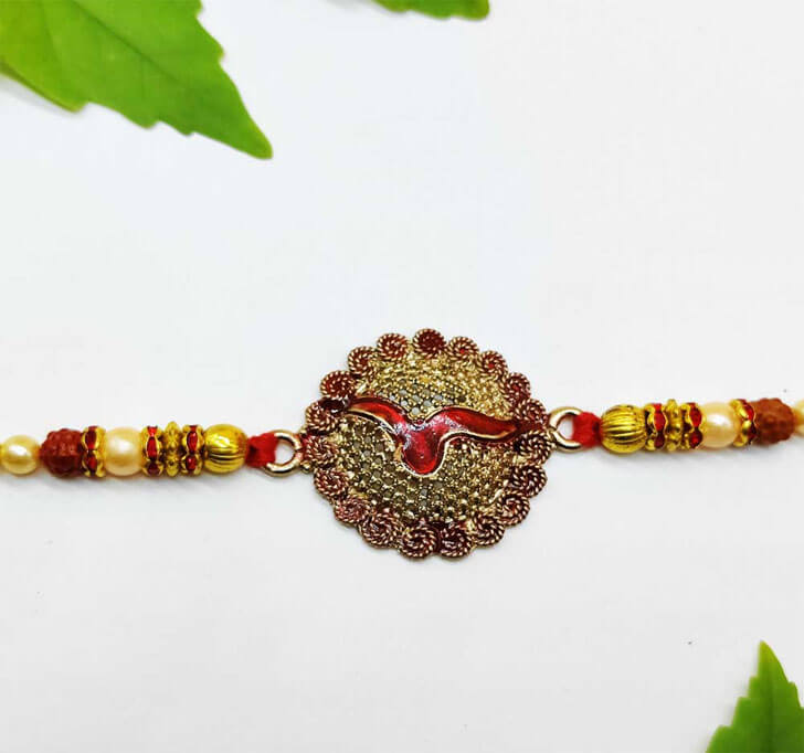 Buy Traditional Designer Golden Center Piece Bhaiya Rakhi