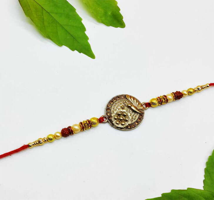 Buy Golden Butterfly Designer Center Piece Bhaiya Rakhi