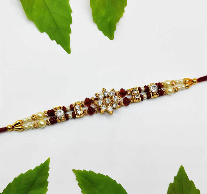 Buy American Diamond Stone Center Piece Bhaiya Rakhi
