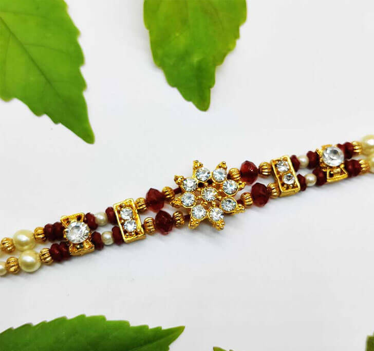 Buy American Diamond Stone Center Piece Bhaiya Rakhi