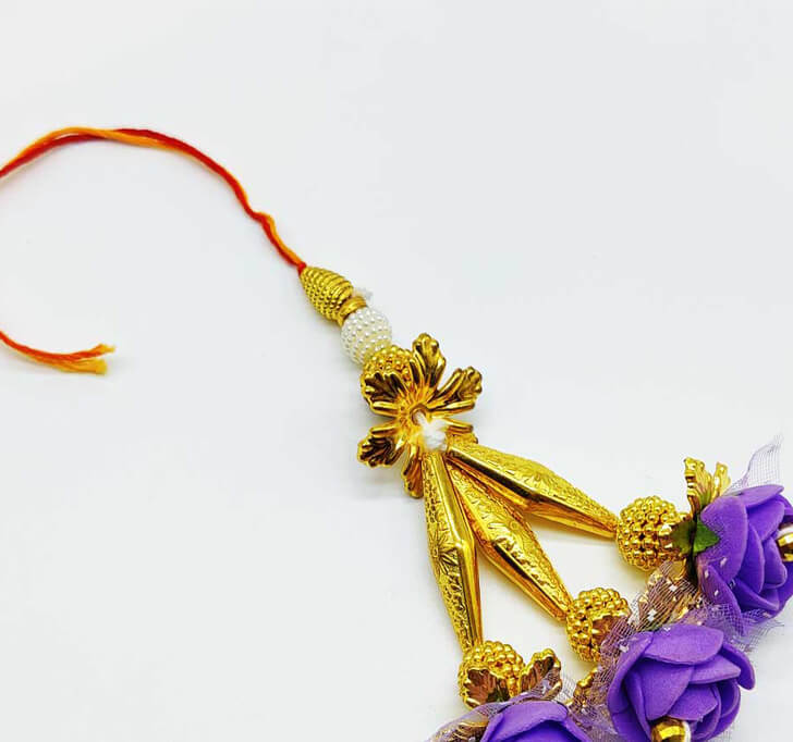 Buy Purple Fancy Floral Lumba Rakhi