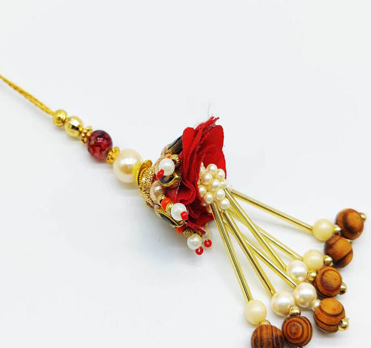 Buy Charming Fancy Red Floral Lumba Rakhi