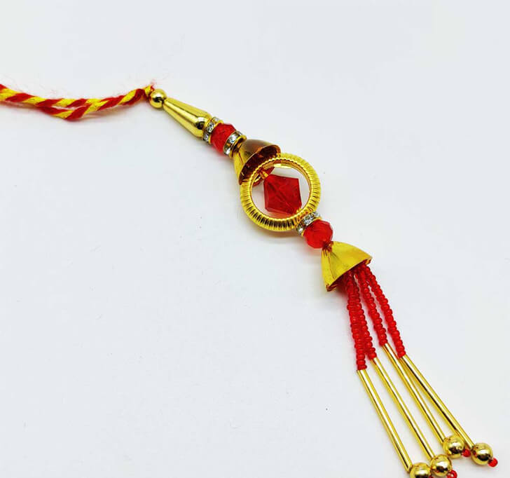 Buy Charming Fancy Golden Lumba Rakhi