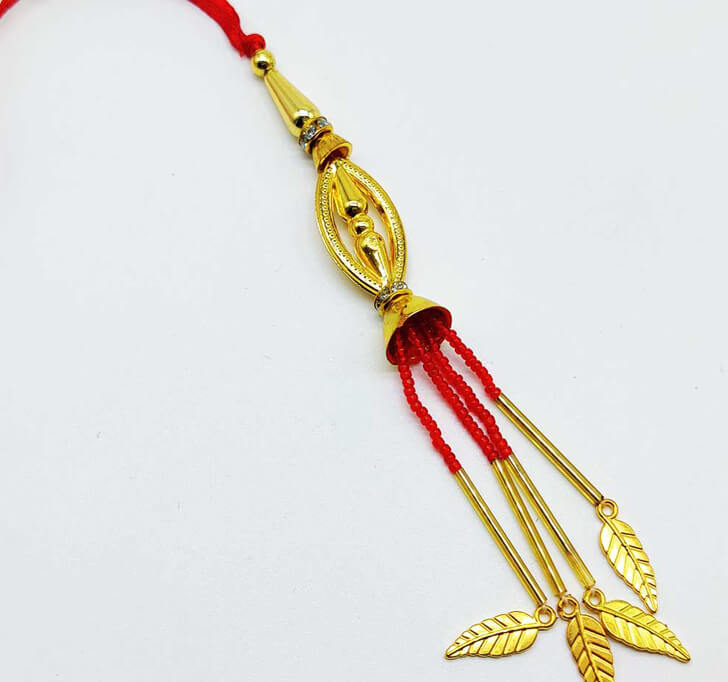 Buy Golden Fancy Leaf Designer Lumba Rakhi