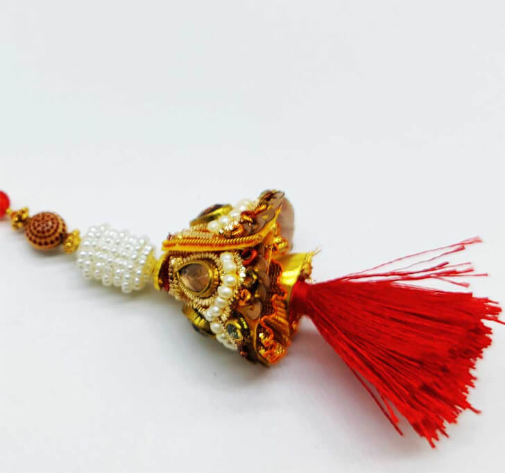Buy Red Handmade Floral Lumba Rakhi