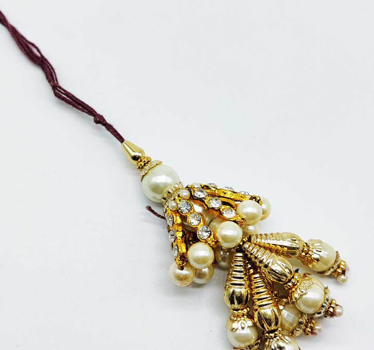 Buy Golden AD Stone Lumba Rakhi