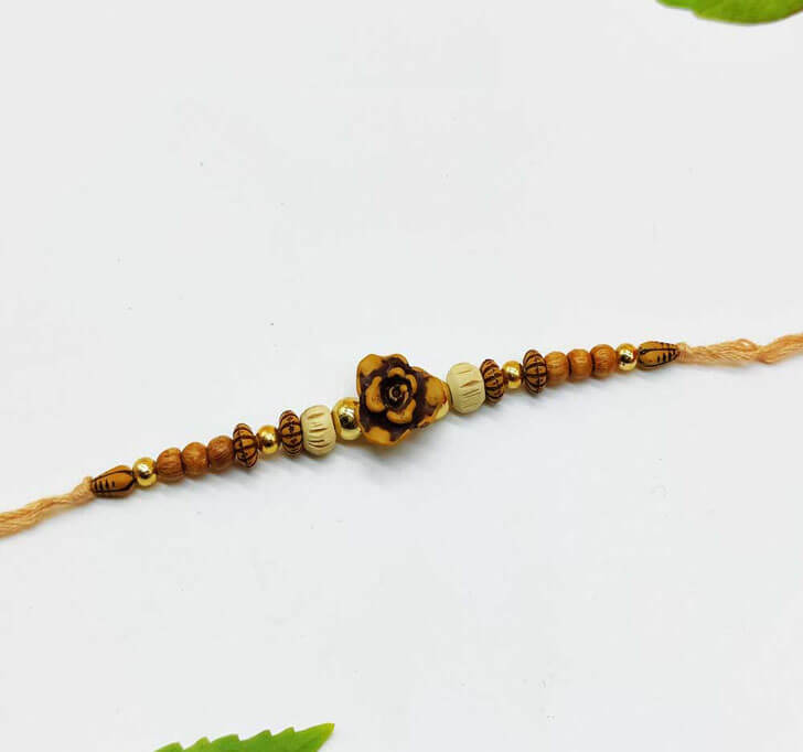 Buy Wooden Beads Center Piece Bhaiya Rakhi