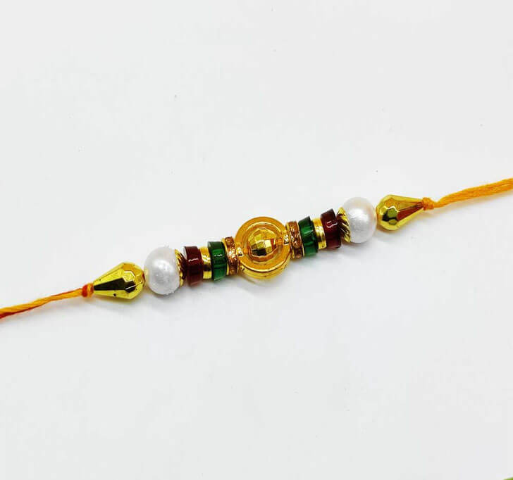 Buy Designer Golden Center Piece Bhaiya Rakhi