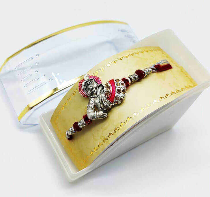 Buy Shree Krishna Designer Center Piece Bhaiya Rakhi