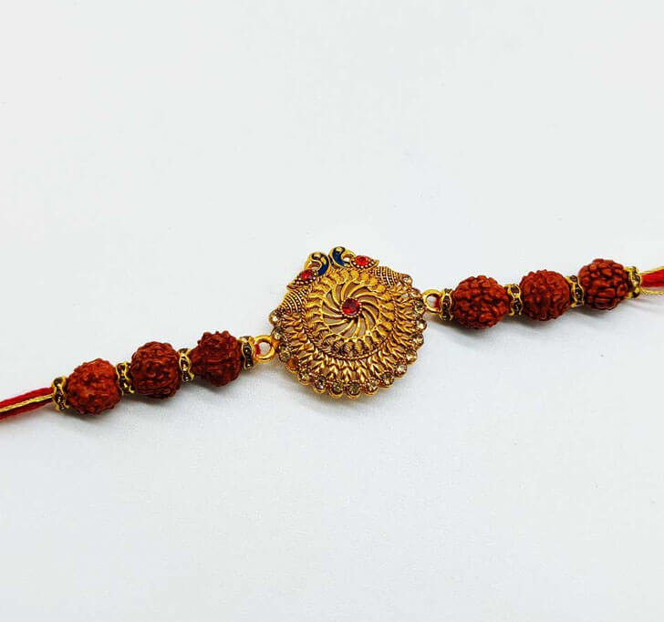 Buy Golden Center Piece Rudraksha Bhaiya Rakhi