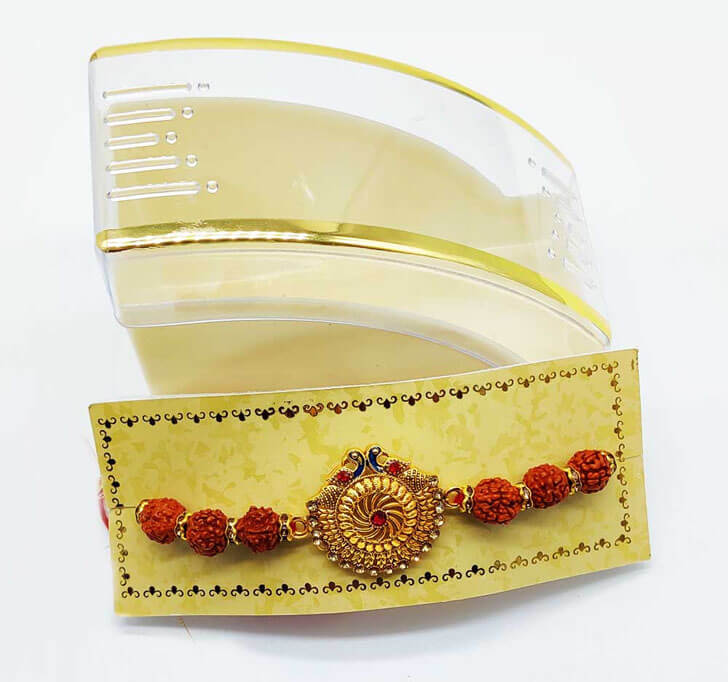 Buy Golden Center Piece Rudraksha Bhaiya Rakhi