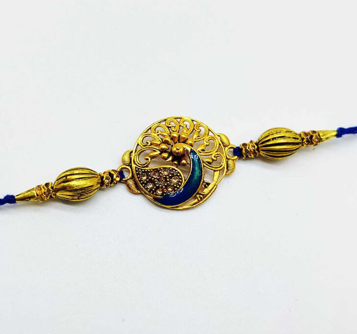 Buy Golden Peacock Center Piece Bhaiya Rakhi