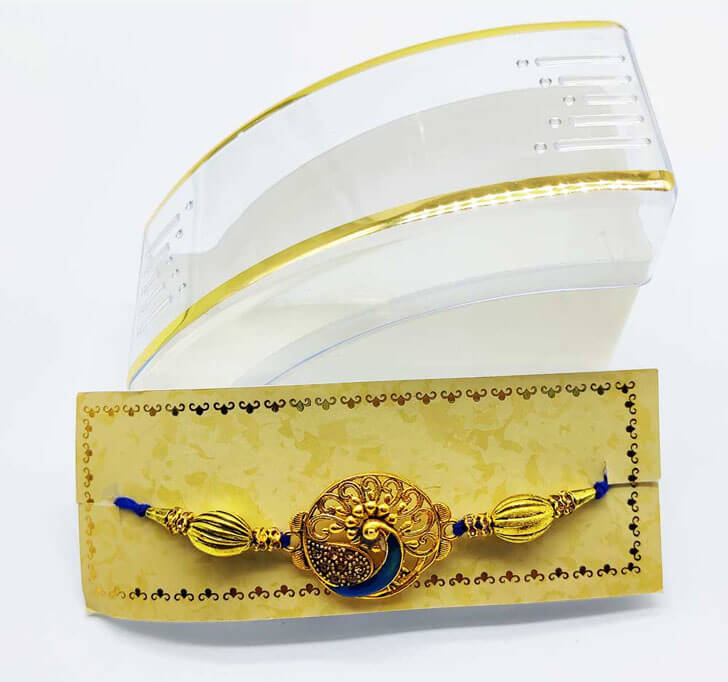 Buy Golden Peacock Center Piece Bhaiya Rakhi
