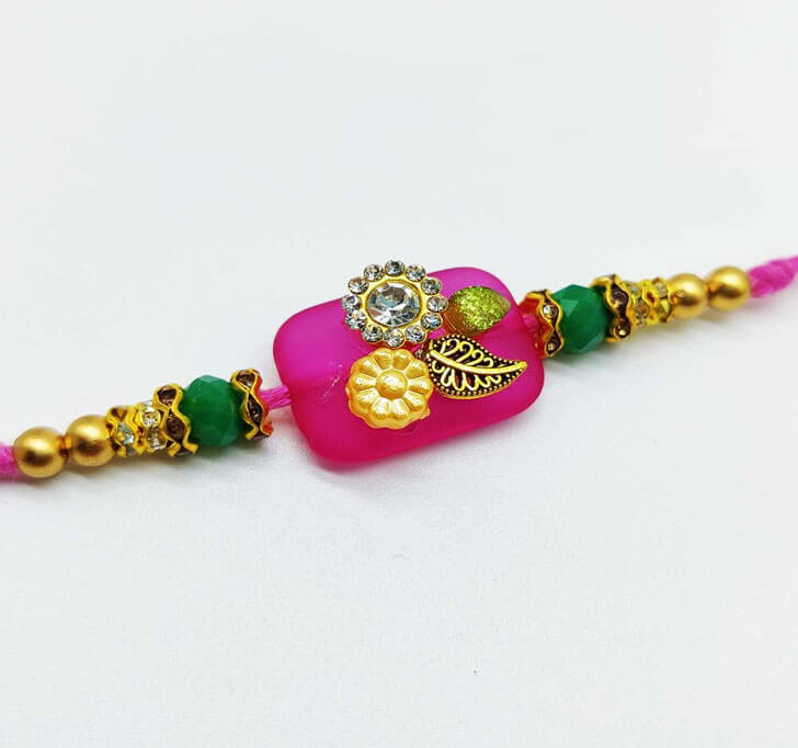 Buy Charming Pink Diamond Center Piece Bhaiya Rakhi