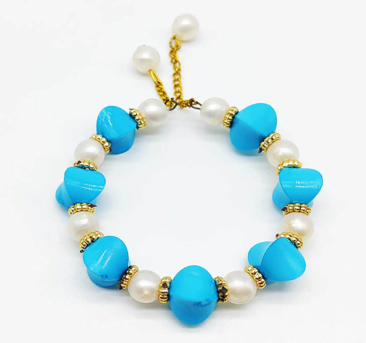 Buy Blue Floral Designer White Pearl Beads Kada Rakhi