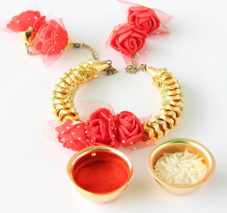 Buy Handcrafted Floral Lumba Kada Rakhi