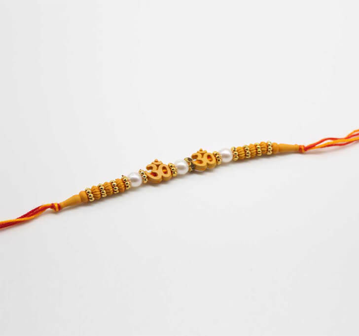 Buy Fancy OM Designer Dora Bhaiya Rakhi