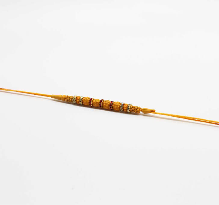 Buy Yellow Attractive Rudraksha Dora Bhaiya Rakhi