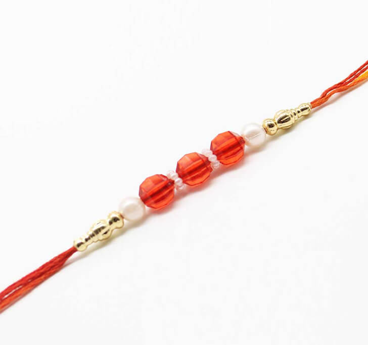 Buy Pink Artificial Pearl Beads Dora Bhaiya Rakhi